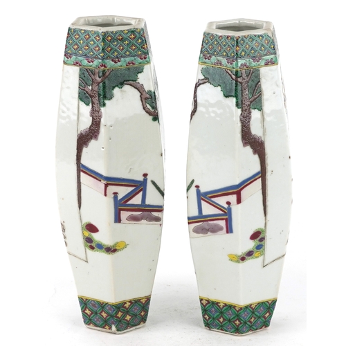 137 - A pair of Chinese porcelain hexagonal vases hand painted with an emperor and attendants, four figure... 