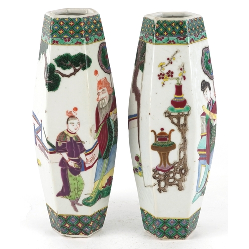 137 - A pair of Chinese porcelain hexagonal vases hand painted with an emperor and attendants, four figure... 