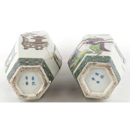 137 - A pair of Chinese porcelain hexagonal vases hand painted with an emperor and attendants, four figure... 