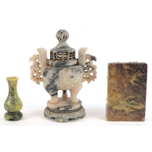 566 - Three Chinese stone carvings including a twin handled incense burner and a spinach green stone vase,... 