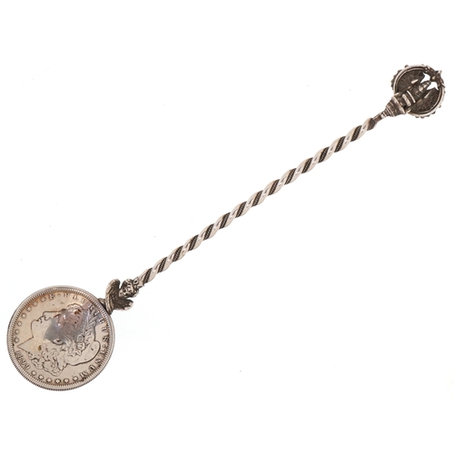 3664 - A USA 1899 silver Morgan dollar spoon, 18cm in length, 51.4g.