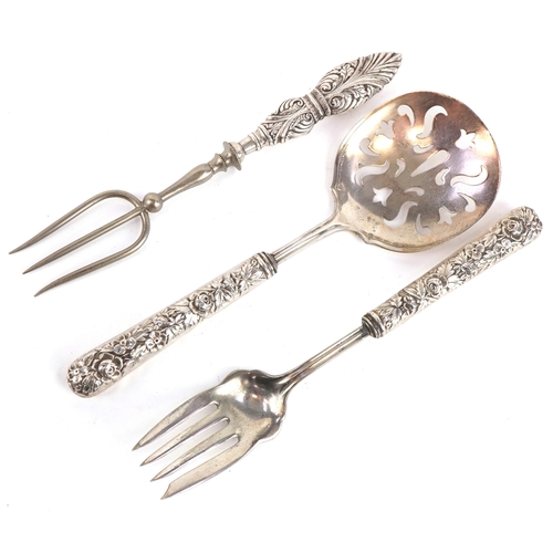 3652 - A pair of GHF sterling silver handled salad servers together with a Crisford & Norris silver handled... 
