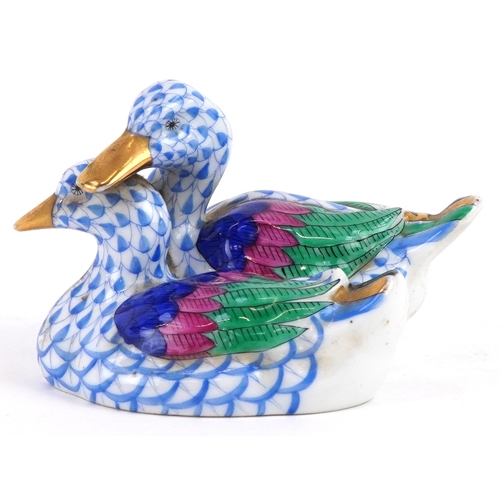 611 - Herend, a Hungarian porcelain figure group of two ducks hand painted in the Fishnet pattern, 11.5cm ... 