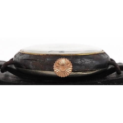 2754 - A British military World War I trench watch having enamelled dial with Arabic numerals, 33mm in diam... 