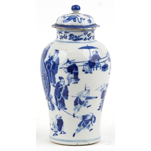 89 - A Chinese porcelain blue and white baluster vase and cover hand painted with figures, character mark... 