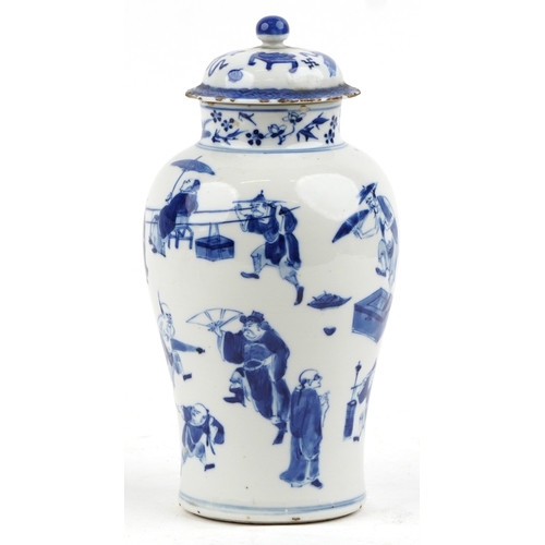 89 - A Chinese porcelain blue and white baluster vase and cover hand painted with figures, character mark... 