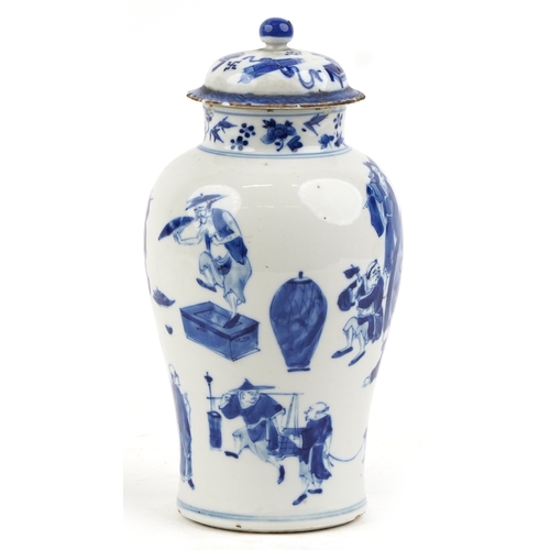 89 - A Chinese porcelain blue and white baluster vase and cover hand painted with figures, character mark... 