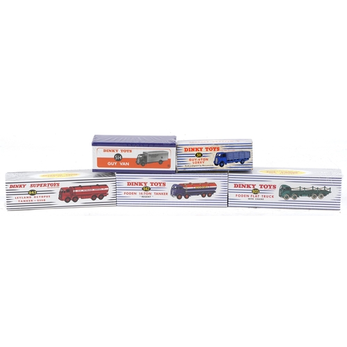 704 - Four as new reproduction Dinky Toys diecast vehicles with boxes and a vintage Guy 4 Ton Lorry number... 
