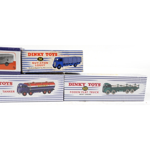 704 - Four as new reproduction Dinky Toys diecast vehicles with boxes and a vintage Guy 4 Ton Lorry number... 