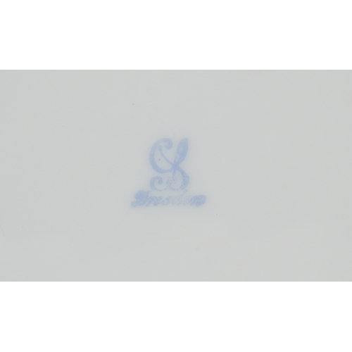 33 - A Dresden porcelain fruit bowl hand painted with flowers, 24cm in diameter.