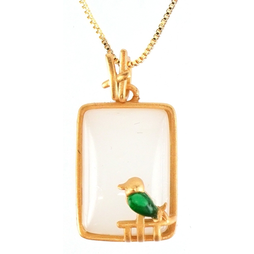 3343 - A yellow metal opalescent pendant mounted with a bird, on a silver gilt necklace, 2.7cm high and 44c... 