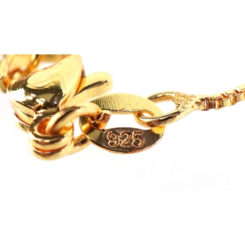 3343 - A yellow metal opalescent pendant mounted with a bird, on a silver gilt necklace, 2.7cm high and 44c... 