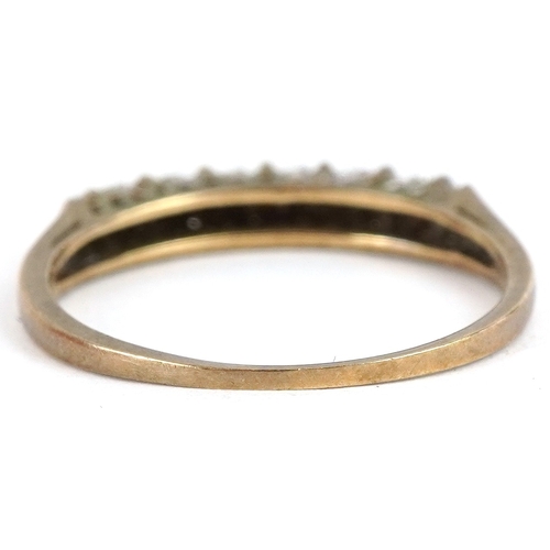 3093 - A 9ct gold diamond half eternity ring, size K, 1.1g.