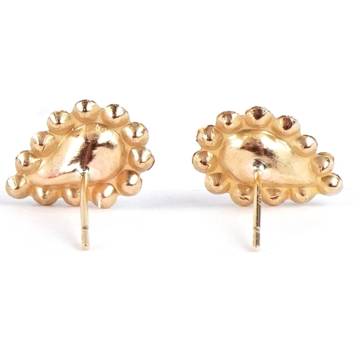 3125 - A pair of 9ct gold pink and white Austrian crystal teardrop stud earrings, 1.2cm high, total 0.8g.