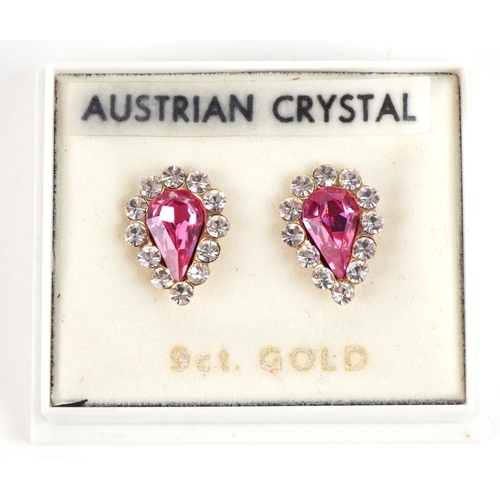 3125 - A pair of 9ct gold pink and white Austrian crystal teardrop stud earrings, 1.2cm high, total 0.8g.