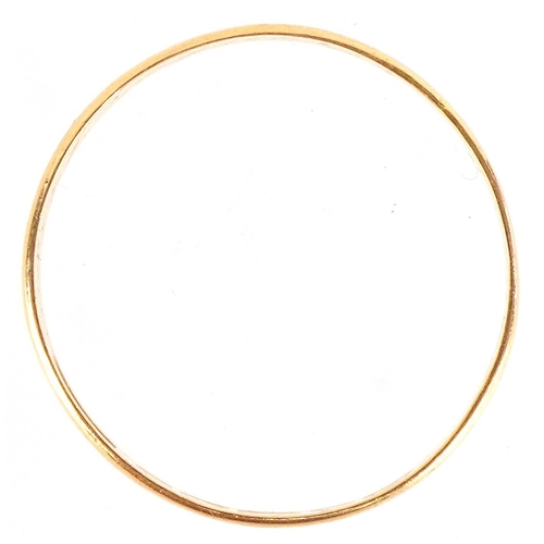 3049 - An Elizabeth II 22ct gold wedding band, London 1953, size X, 2.0g.