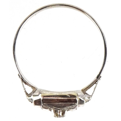 3360 - A French Art Deco white metal diamond solitaire ring, impressed eagle head mark, size M, 1.2g.