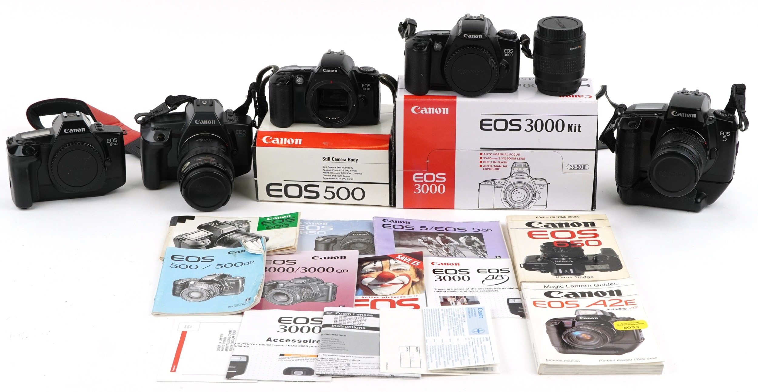 Five Canon EOS cameras and some lenses, comprising EOS 650, EOS 500 ...