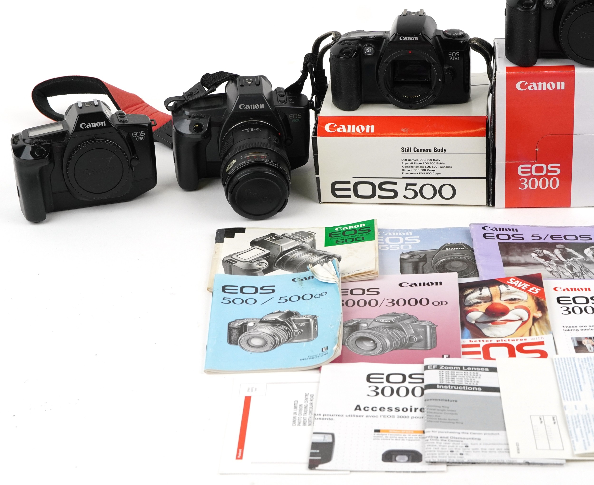 Five Canon EOS cameras and some lenses, comprising EOS 650, EOS 500 ...