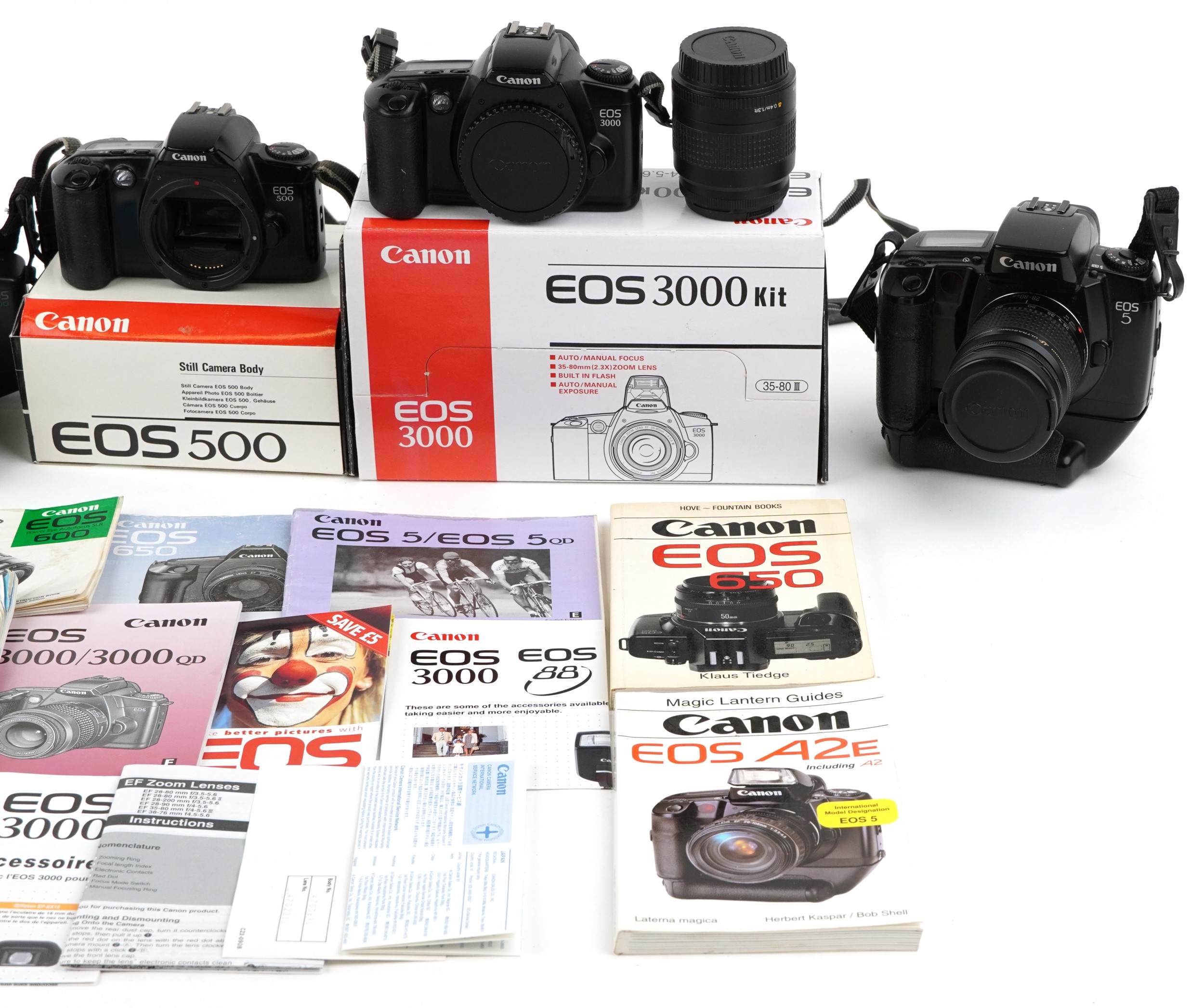 Five Canon EOS cameras and some lenses, comprising EOS 650, EOS 500 ...