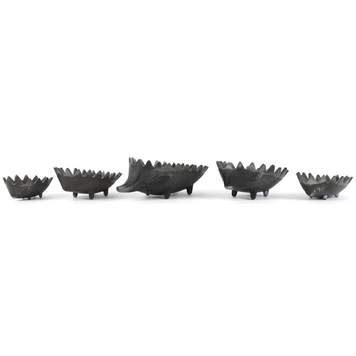 214 - In the manner of Walter Bosse, a graduated set of five bronzed ashtrays in the form of Hedgehogs, th... 