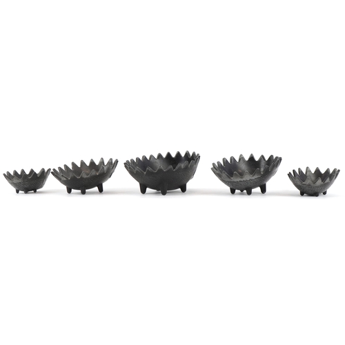 214 - In the manner of Walter Bosse, a graduated set of five bronzed ashtrays in the form of Hedgehogs, th... 
