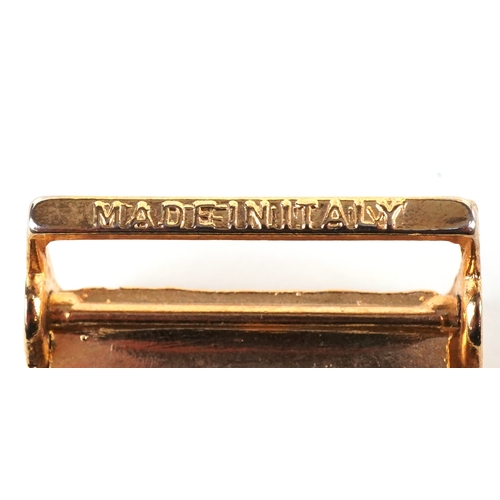 1843 - Three vintage belt buckles including 1986 motorcycle buckle and a white metal wings and torch flame ... 