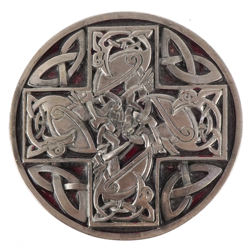 1844 - Dragon Designs Tanside, a white metal and enamel Celtic cross belt buckle, 8cm in diameter.