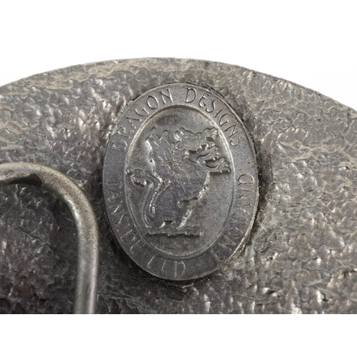 1844 - Dragon Designs Tanside, a white metal and enamel Celtic cross belt buckle, 8cm in diameter.