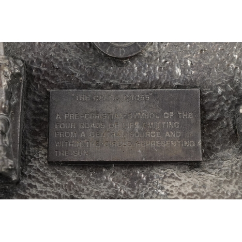 1844 - Dragon Designs Tanside, a white metal and enamel Celtic cross belt buckle, 8cm in diameter.