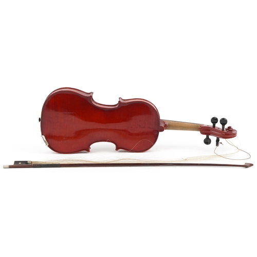 2577 - An old wooden violin with two piece back with bow and protective case, the violin back 13 3/4 inches... 