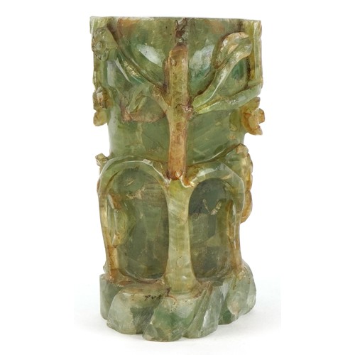459 - A Chinese green quartz naturalistic carved lamp base, 16cm high.
