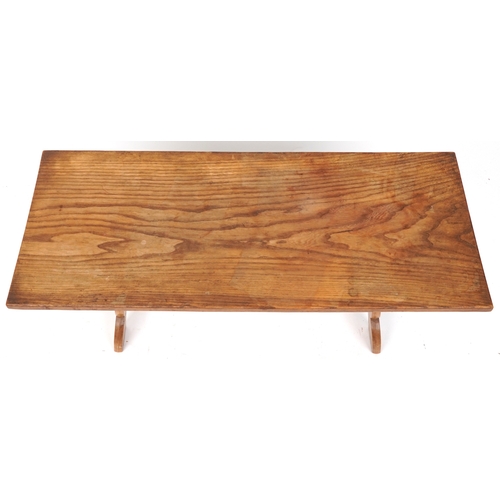 2006 - A 20th century elm rectangular coffee table by Jack Grimble, Cromer, raised on shaped supports, 48cm... 