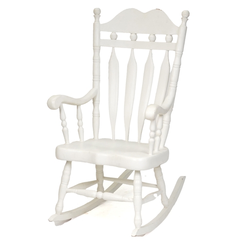 2085 - A 20th century white painted rocking chair on turned supports, 116cm H x 65cm W x 77cm D.