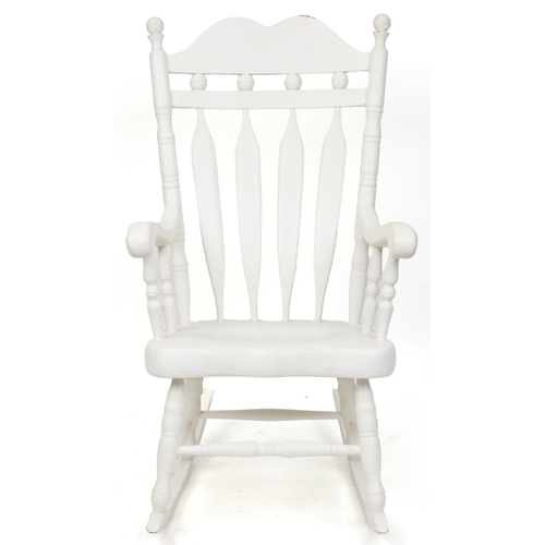 2085 - A 20th century white painted rocking chair on turned supports, 116cm H x 65cm W x 77cm D.