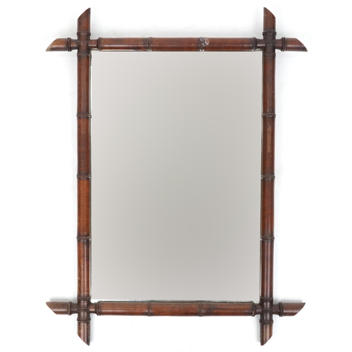 2115 - An early 20th century faux bamboo framed rectangular wall mirror, 84cm x 66cm.