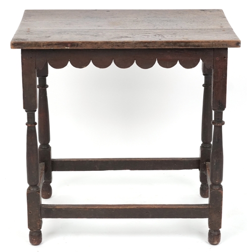 2108 - A Victorian oak rectangular side table raised on turned and block legs united by stretchers, 62cm H ... 