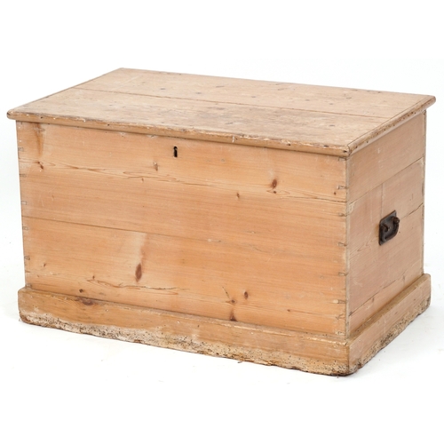 2013 - An early 20th century stripped blanket box, the hinged lid revealing a candle box, fitted with drop ... 