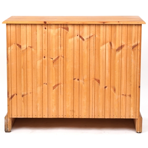 2140 - A late 20th century pine side cabinet fitted with two drawers and cupboards, on a plinth base, 81cm ... 