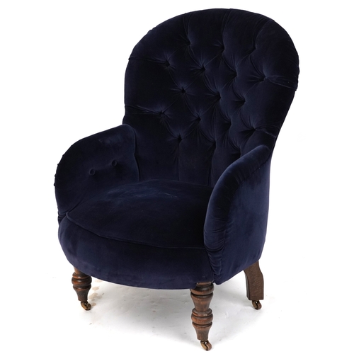 2093 - A 20th century Victorian style button back armchair upholstered in blue velour, 86cm high x 59cm wid... 
