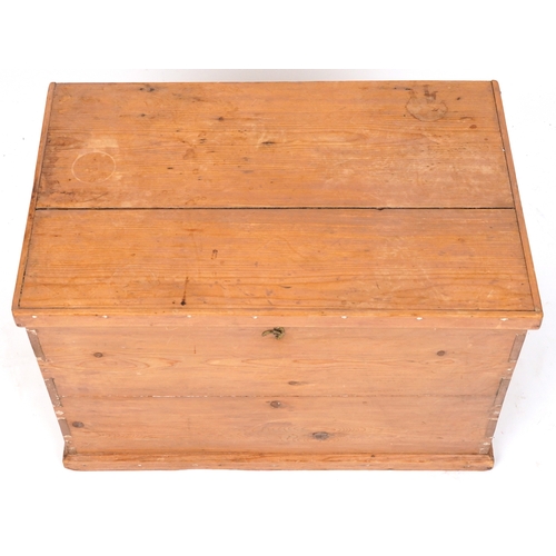 2183A - An early 20th century pine blanket box fitted with applied metal handles, 47cm H x 73cm W x 46cm D.