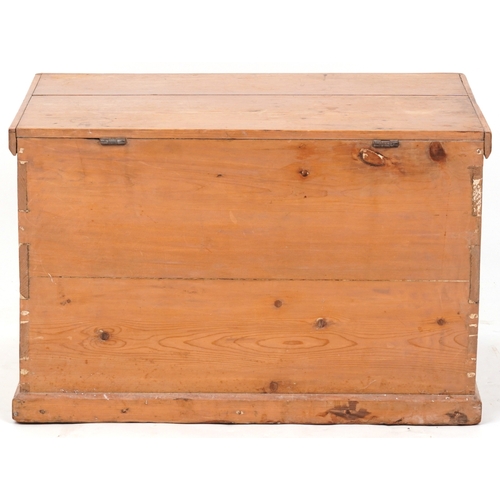 2183A - An early 20th century pine blanket box fitted with applied metal handles, 47cm H x 73cm W x 46cm D.
