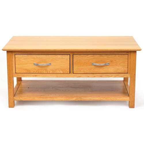 2036 - A modern oak coffee table fitted with two drawers above and under tier, 50cm H x 109cm W x 58cm D.