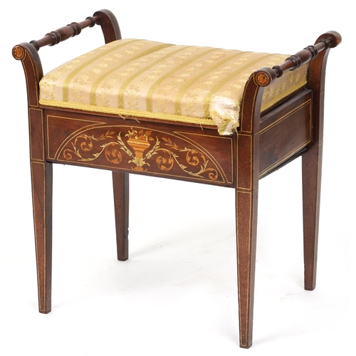 2183 - A late Victorian mahogany piano stool, the overstuffed hinged seat above an inlaid panel, raised on ... 