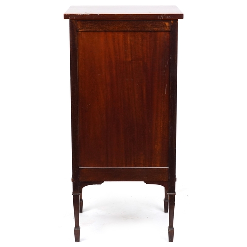2042 - An Edwardian mahogany music cabinet with satinwood crossbanded decoration, raised on square tapering... 