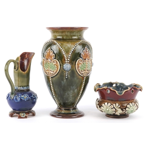 327 - Doulton Lambeth, Art Nouveau stoneware comprising a vase ewer and a pot, the largest 17.5cm high.