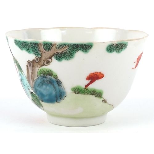 352 - A Chinese porcelain footed rice bowl with scalloped rim hand painted in the famille verte palette wi... 