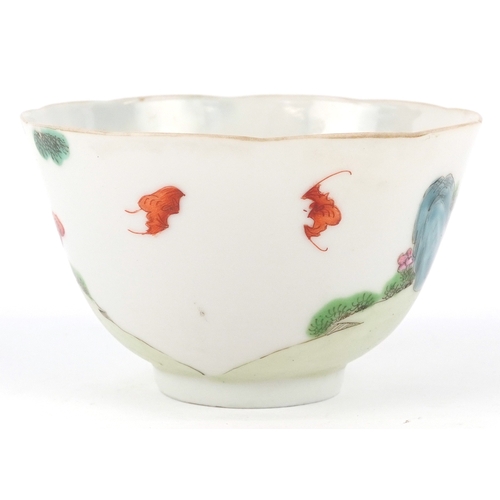 352 - A Chinese porcelain footed rice bowl with scalloped rim hand painted in the famille verte palette wi... 