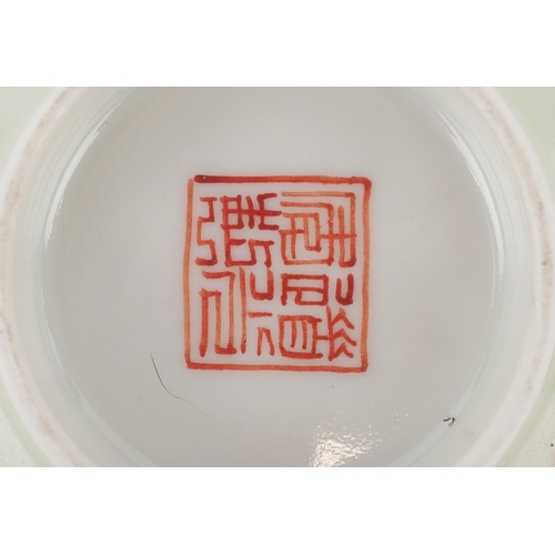 352 - A Chinese porcelain footed rice bowl with scalloped rim hand painted in the famille verte palette wi... 