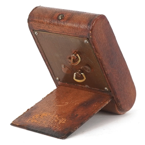 23 - An Art Deco Jaeger LeCoultre folding alarm clock with Arabic numerals, 9cm high.